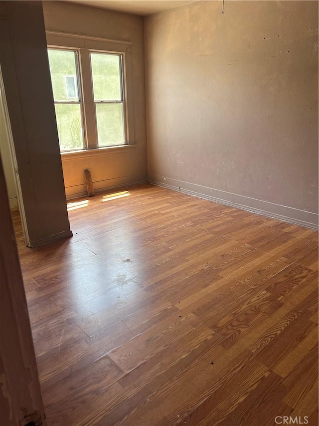 1909 E 59th St, Long Beach, CA 90805 - unfurnished room with wood finished floors