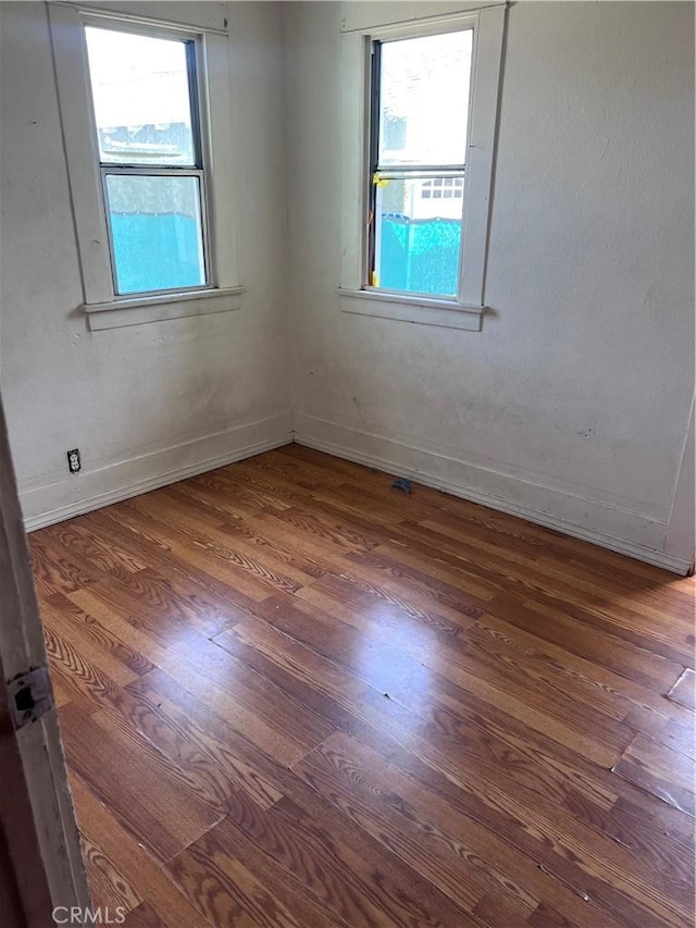 1909 E 59th St, Long Beach, CA 90805 - unfurnished room featuring wood finished floors and baseboards