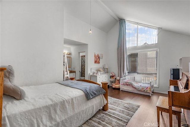 5463 Newcastle Ave Unit 8, Encino, CA 91316 - bedroom with high vaulted ceiling and wood finished floors