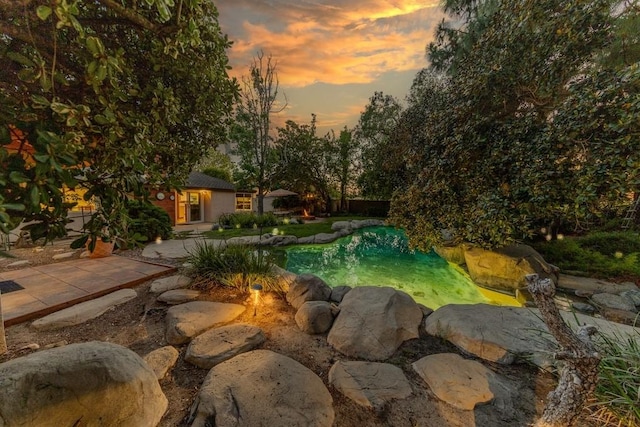 18269 Laurel View Dr, Yorba Linda, CA 92886 - pool at dusk featuring an outdoor pool