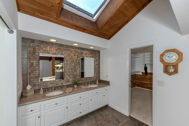 18269 Laurel View Dr, Yorba Linda, CA 92886 - bathroom with a skylight, double vanity, wooden ceiling, vaulted ceiling, and tasteful backsplash