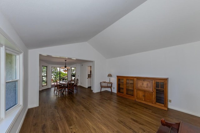 18269 Laurel View Dr, Yorba Linda, CA 92886 - living room with dark wood-type flooring, a chandelier, and lofted ceiling