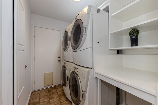 18269 Laurel View Dr, Yorba Linda, CA 92886 - washroom featuring stacked washing machine and dryer and stone finish flooring
