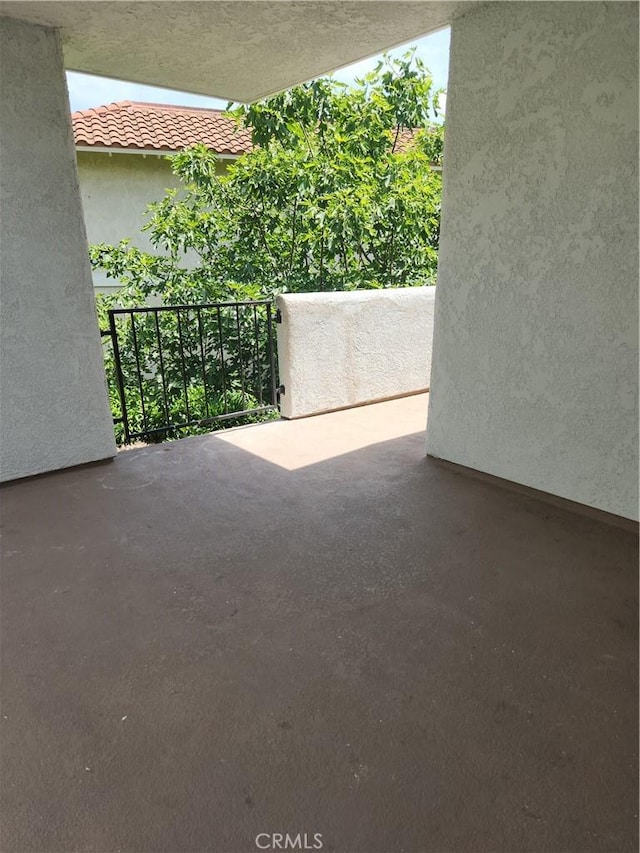 2119 Via Puerta Unit Q, Laguna Woods, CA 92637 - view of patio / terrace featuring a balcony