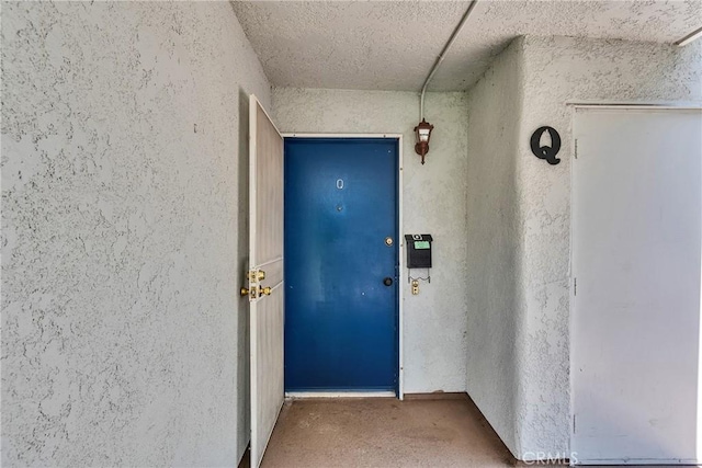 2119 Via Puerta Unit Q, Laguna Woods, CA 92637 - property entrance featuring stucco siding