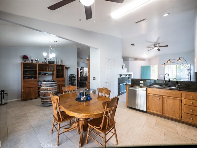 1173 Conestoga St, Corona, CA 92881 - dining area with a ceiling fan, lofted ceiling, and light tile patterned flooring