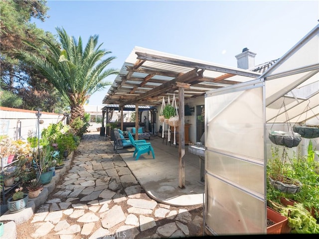1173 Conestoga St, Corona, CA 92881 - view of patio with a pergola and an exterior structure