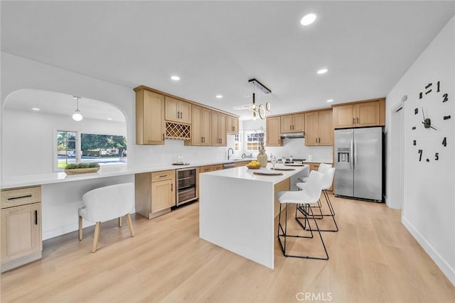 1321 S 8th Ave, Arcadia, CA 91006 - kitchen with stainless steel fridge with ice dispenser, beverage cooler, light wood-type flooring, a sink, and light countertops