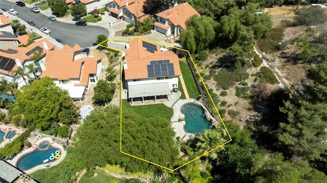 20128 Cavern Ct, Saugus, CA 91390 - aerial view of residential area with a pool and property parcel outlined