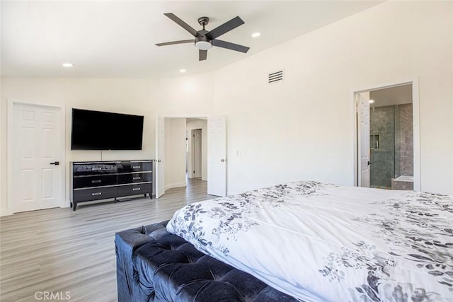 20128 Cavern Ct, Saugus, CA 91390 - bedroom featuring lofted ceiling, light wood-style flooring, recessed lighting, ceiling fan, and ensuite bathroom