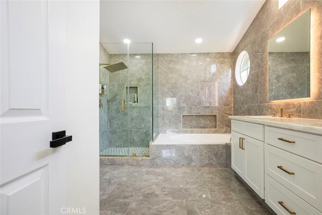 20128 Cavern Ct, Saugus, CA 91390 - full bathroom with a garden tub, vanity, a marble finish shower, and recessed lighting