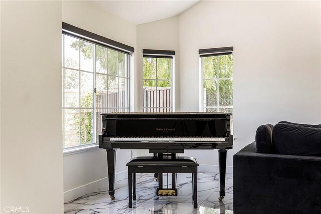 20128 Cavern Ct, Saugus, CA 91390 - living area with marble tiled flooring, baseboards, and lofted ceiling