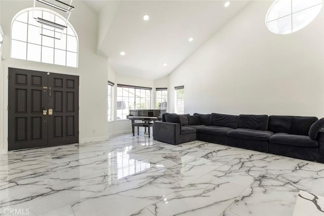 20128 Cavern Ct, Saugus, CA 91390 - foyer featuring high vaulted ceiling, marble tiled flooring, recessed lighting, and baseboards