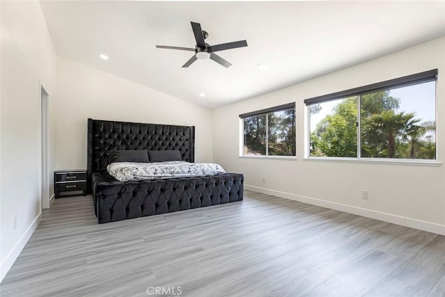 20128 Cavern Ct, Saugus, CA 91390 - bedroom with wood finished floors, baseboards, vaulted ceiling, recessed lighting, and a ceiling fan