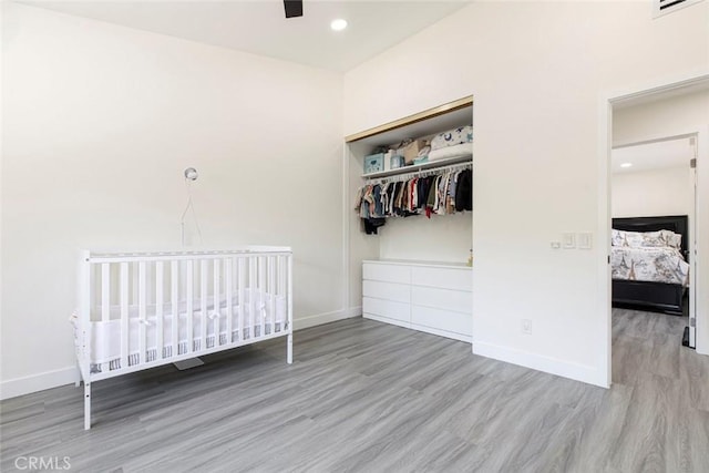 20128 Cavern Ct, Saugus, CA 91390 - unfurnished bedroom featuring wood finished floors, baseboards, a closet, and recessed lighting