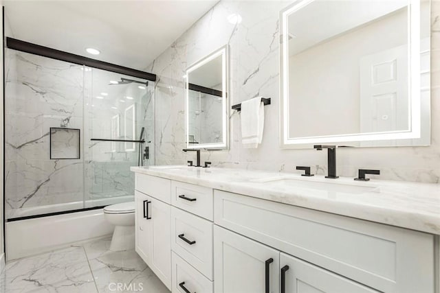 20128 Cavern Ct, Saugus, CA 91390 - full bath featuring marble finish flooring, toilet, double vanity, bath / shower combo with glass door, and recessed lighting