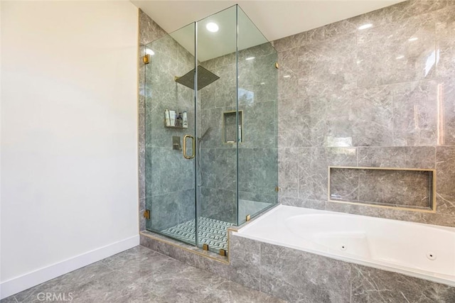 20128 Cavern Ct, Saugus, CA 91390 - bathroom featuring baseboards, a jetted tub, and a shower stall