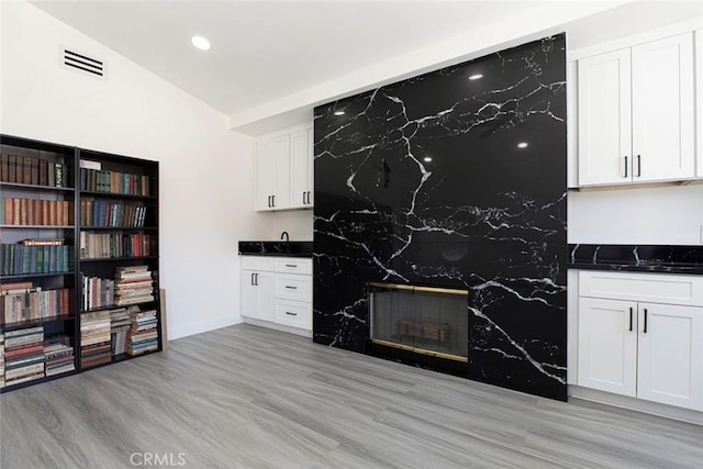 20128 Cavern Ct, Saugus, CA 91390 - living area featuring light wood-type flooring, recessed lighting, and baseboards