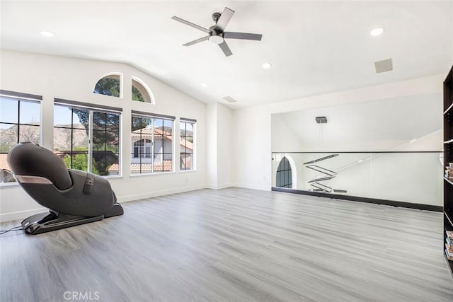 20128 Cavern Ct, Saugus, CA 91390 - unfurnished living room with wood finished floors, ceiling fan, vaulted ceiling, baseboards, and recessed lighting