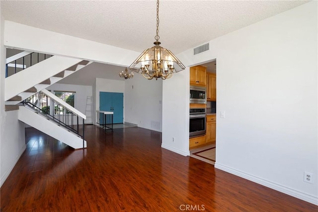 3016 Daphney Ct, Simi Valley, CA 93063 - unfurnished dining area with a chandelier, stairs, wood finished floors, and a textured ceiling