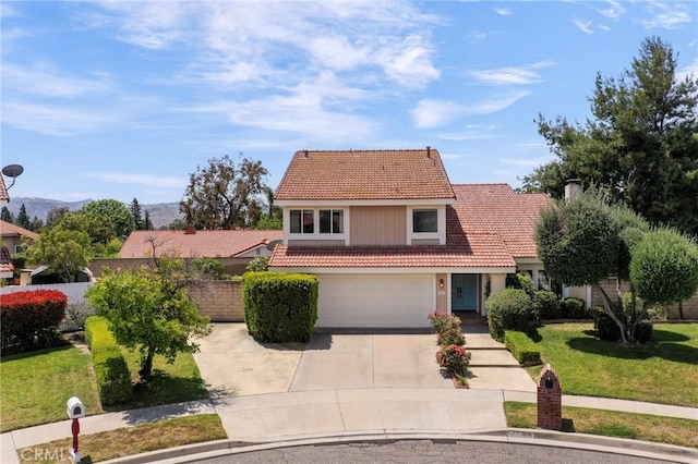 3016 Daphney Ct, Simi Valley, CA 93063 - traditional home with a tile roof, driveway, a front yard, a garage, and a mountain view