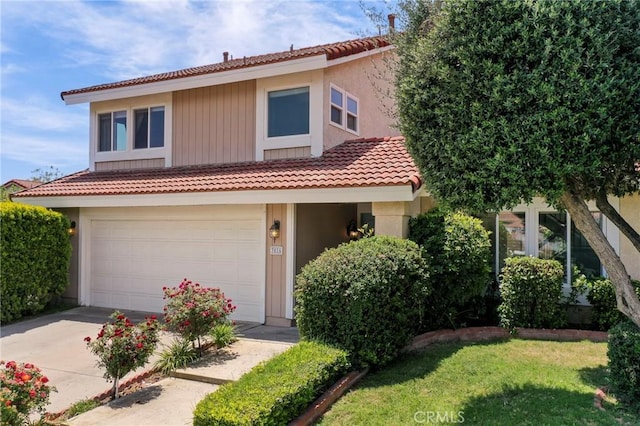 3016 Daphney Ct, Simi Valley, CA 93063 - view of front of house featuring a tile roof, an attached garage, driveway, a front lawn, and stucco siding