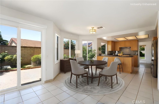 3016 Daphney Ct, Simi Valley, CA 93063 - dining area featuring light tile patterned flooring and baseboards