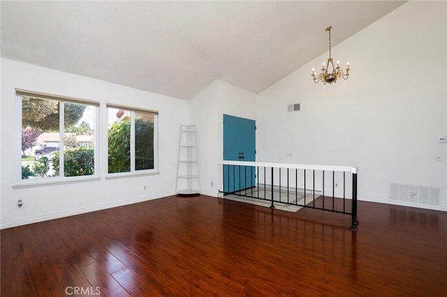 3016 Daphney Ct, Simi Valley, CA 93063 - empty room featuring a chandelier, wood finished floors, and high vaulted ceiling