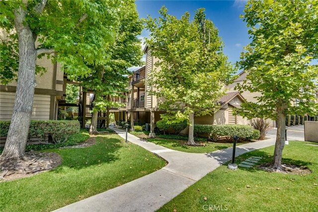 4201 W 5th St Unit 218, Santa Ana, CA 92703 - surrounding community with a lawn