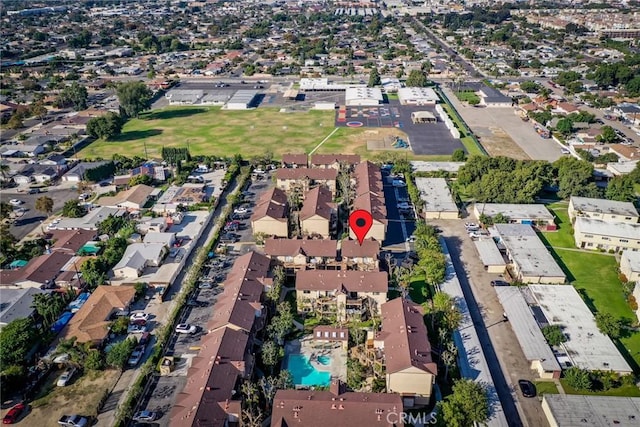 4201 W 5th St Unit 218, Santa Ana, CA 92703 - aerial overview of property's location with a pool area and nearby suburban area
