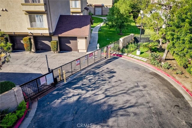 4201 W 5th St Unit 218, Santa Ana, CA 92703 - surrounding community with driveway and a garage