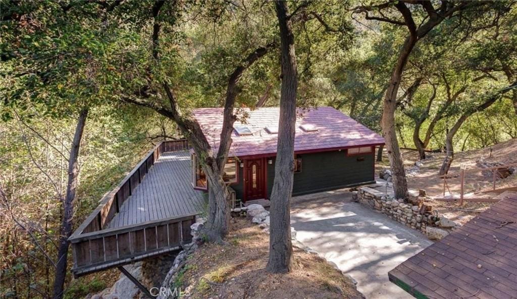 4030 Chaney Trl, Altadena, CA 91001 - rustic home featuring a forest view