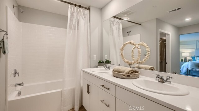 30020 Pomo Canyon Ct, Menifee, CA 92585 - full bathroom featuring shower / bath combination with curtain, double vanity, and ensuite bathroom
