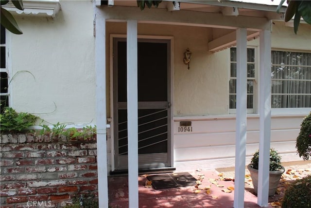 10941 Peach Grove St, North Hollywood, CA 91601 - entrance to property featuring stucco siding
