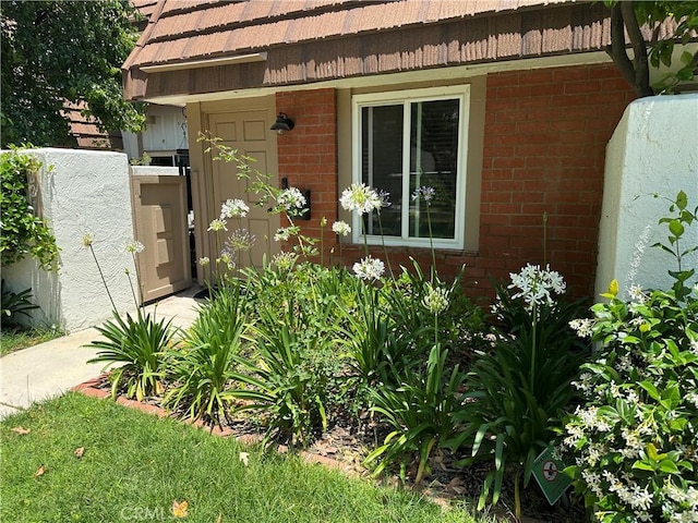 22161 James Alan Cir, Chatsworth, CA 91311 - view of exterior entry featuring brick siding