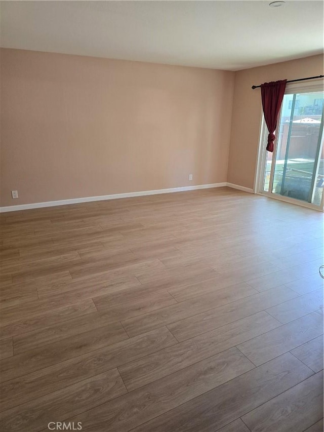 400 N Acacia Ave Unit D16, Fullerton, CA 92831 - unfurnished room featuring wood finished floors and baseboards