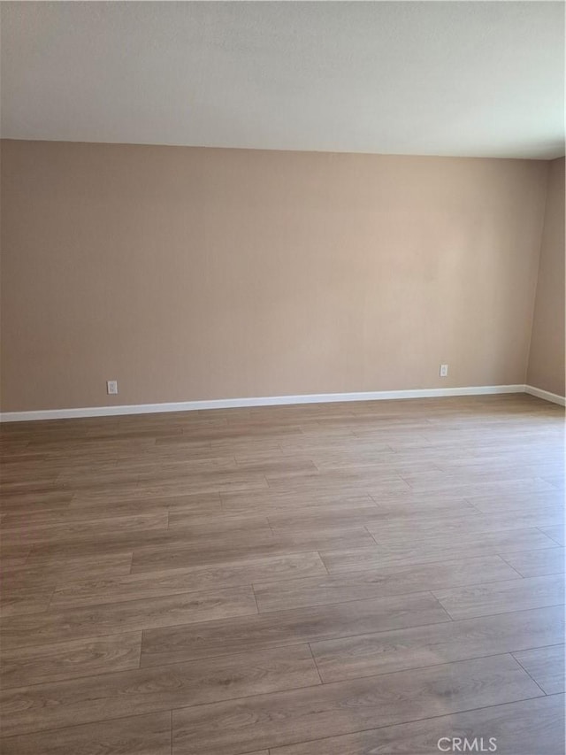 400 N Acacia Ave Unit D16, Fullerton, CA 92831 - empty room with baseboards and wood finished floors