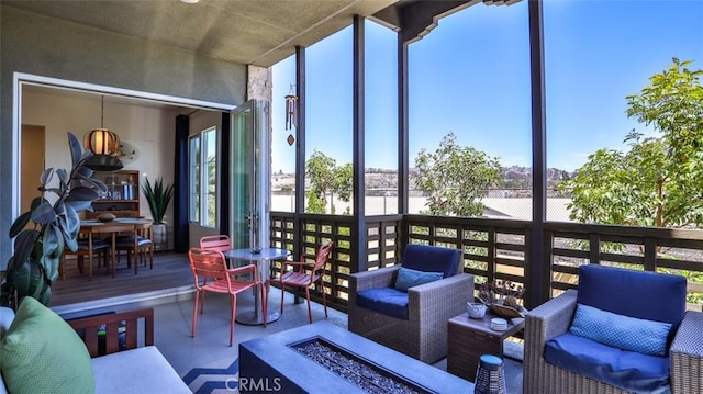1207 Doheny Way, Dana Point, CA 92629 - sunroom with an outdoor living space with a fire pit