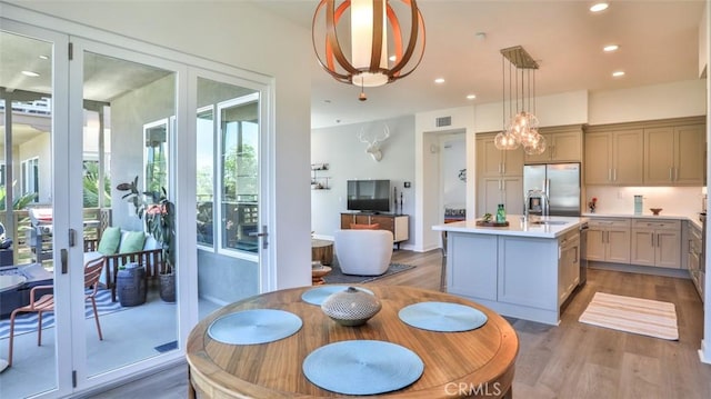 1207 Doheny Way, Dana Point, CA 92629 - dining space featuring light wood-style flooring, a chandelier, and recessed lighting
