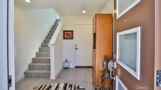 1207 Doheny Way, Dana Point, CA 92629 - foyer featuring stairway, light tile patterned floors, and recessed lighting