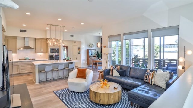 1207 Doheny Way, Dana Point, CA 92629 - living area featuring light wood-style flooring and recessed lighting