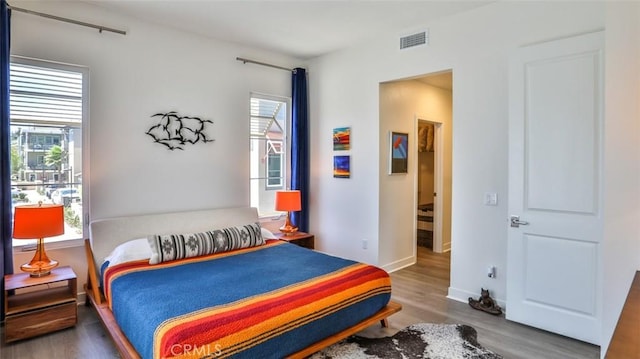 1207 Doheny Way, Dana Point, CA 92629 - bedroom with multiple windows and wood finished floors