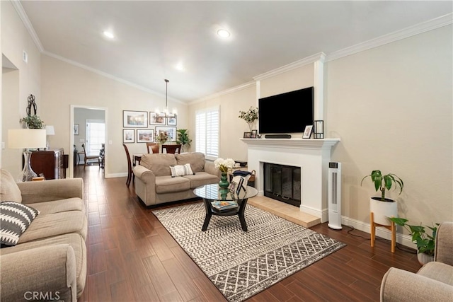 2355 S Pinehurst Pl, Ontario, CA 91761 - living area featuring baseboards, a chandelier, dark wood-type flooring, a glass covered fireplace, and crown molding