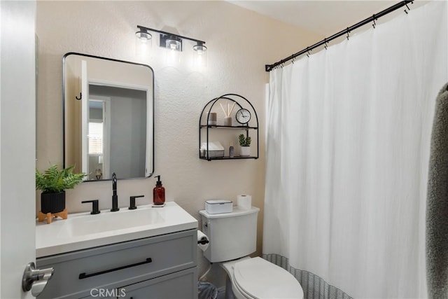 2355 S Pinehurst Pl, Ontario, CA 91761 - bathroom with toilet, vanity, and a shower with curtain
