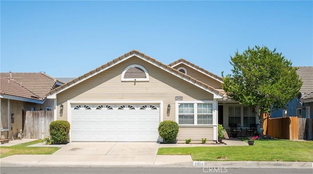 2355 S Pinehurst Pl, Ontario, CA 91761 - view of front of property featuring a garage, driveway, and a tile roof