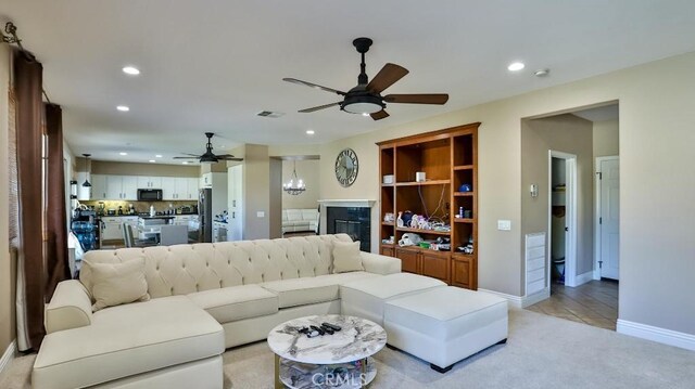 35430 Azalea Cir, Winchester, CA 92596 - living room with a ceiling fan, recessed lighting, light carpet, and baseboards