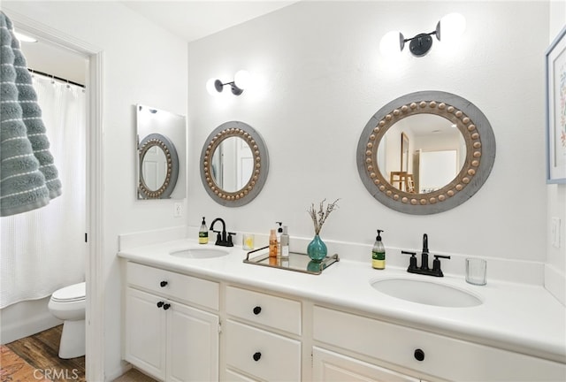 3 Bluff Cove Dr, Aliso Viejo, CA 92656 - full bath with toilet, double vanity, and wood finished floors