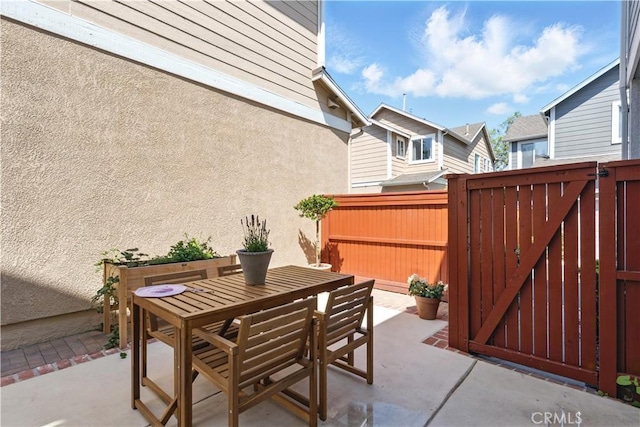 3 Bluff Cove Dr, Aliso Viejo, CA 92656 - view of patio / terrace with outdoor dining area and a gate