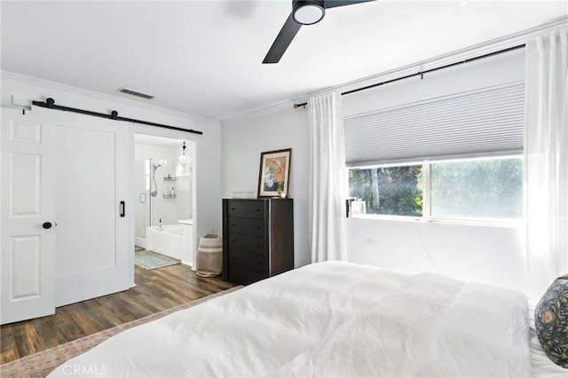 3 Bluff Cove Dr, Aliso Viejo, CA 92656 - bedroom with ornamental molding, wood finished floors, a barn door, ensuite bathroom, and ceiling fan