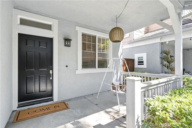 3 Bluff Cove Dr, Aliso Viejo, CA 92656 - property entrance with stucco siding and covered porch